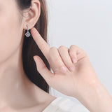 Load image into Gallery viewer, Fine Jewelry 0.6CT Round Cut D Grade VVS1 Moissanite Diamond Stud Earrings 925 Sterling Silver Earrings For Women